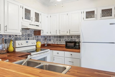 Discover this beautifully updated 2-bedroom, 1.5-bath townhome on Myrtlewood Golf Course and Club  in South Carolina - for sale on GolfHomes.com, golf home, golf lot