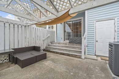 Discover this beautifully updated 2-bedroom, 1.5-bath townhome on Myrtlewood Golf Course and Club  in South Carolina - for sale on GolfHomes.com, golf home, golf lot