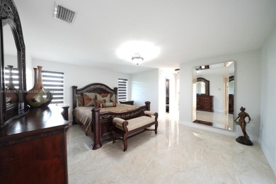 Welcome to this stunning 4-bedroom, 3-bathroom home at 17350 SW on Redland Golf and Country Club in Florida - for sale on GolfHomes.com, golf home, golf lot