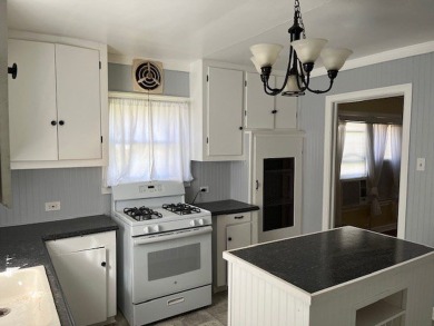 This charming two bedroom, one bath cottage is close to schools on Scott Schriener Municipal Golf Course in Texas - for sale on GolfHomes.com, golf home, golf lot