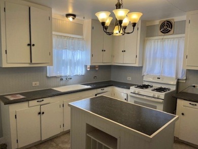 This charming two bedroom, one bath cottage is close to schools on Scott Schriener Municipal Golf Course in Texas - for sale on GolfHomes.com, golf home, golf lot