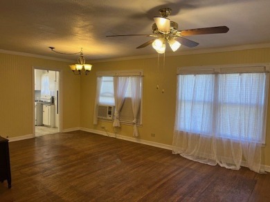 This charming two bedroom, one bath cottage is close to schools on Scott Schriener Municipal Golf Course in Texas - for sale on GolfHomes.com, golf home, golf lot