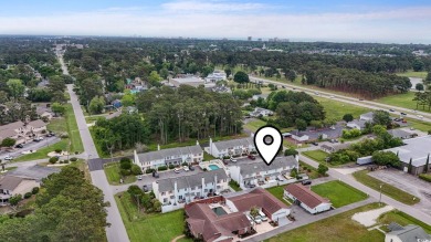 Discover this beautifully updated 2-bedroom, 1.5-bath townhome on Myrtlewood Golf Course and Club  in South Carolina - for sale on GolfHomes.com, golf home, golf lot