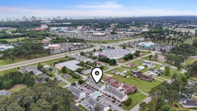 Discover this beautifully updated 2-bedroom, 1.5-bath townhome on Myrtlewood Golf Course and Club  in South Carolina - for sale on GolfHomes.com, golf home, golf lot