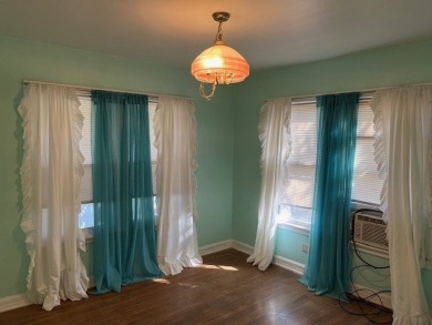 This charming two bedroom, one bath cottage is close to schools on Scott Schriener Municipal Golf Course in Texas - for sale on GolfHomes.com, golf home, golf lot