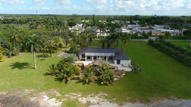 Welcome to this stunning 4-bedroom, 3-bathroom home at 17350 SW on Redland Golf and Country Club in Florida - for sale on GolfHomes.com, golf home, golf lot