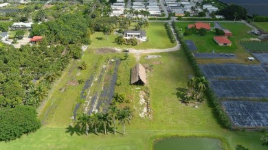 Welcome to this stunning 4-bedroom, 3-bathroom home at 17350 SW on Redland Golf and Country Club in Florida - for sale on GolfHomes.com, golf home, golf lot