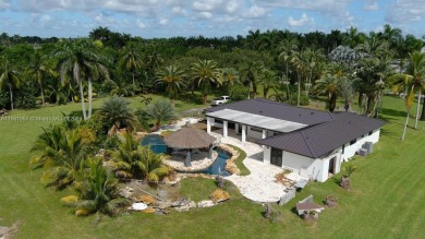 Welcome to this stunning 4-bedroom, 3-bathroom home at 17350 SW on Redland Golf and Country Club in Florida - for sale on GolfHomes.com, golf home, golf lot