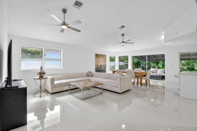Modernly updated, move-in ready 2BR/2.5BA single-story corner on Broken Sound Golf and Club  in Florida - for sale on GolfHomes.com, golf home, golf lot