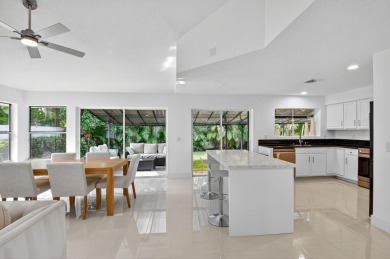 Modernly updated, move-in ready 2BR/2.5BA single-story corner on Broken Sound Golf and Club  in Florida - for sale on GolfHomes.com, golf home, golf lot