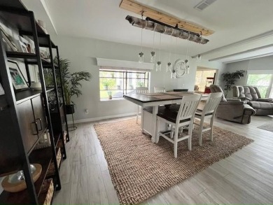 Such a pleasure to move into this updated DREAM HOME located on on Del Tura Golf and Country Club in Florida - for sale on GolfHomes.com, golf home, golf lot