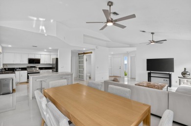 Modernly updated, move-in ready 2BR/2.5BA single-story corner on Broken Sound Golf and Club  in Florida - for sale on GolfHomes.com, golf home, golf lot
