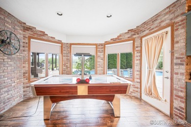Gracing a private cul-de-sac in the prestigious Wallinwood Farms on Wallinwood Springs in Michigan - for sale on GolfHomes.com, golf home, golf lot