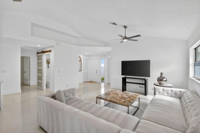 Modernly updated, move-in ready 2BR/2.5BA single-story corner on Broken Sound Golf and Club  in Florida - for sale on GolfHomes.com, golf home, golf lot