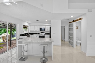 Modernly updated, move-in ready 2BR/2.5BA single-story corner on Broken Sound Golf and Club  in Florida - for sale on GolfHomes.com, golf home, golf lot