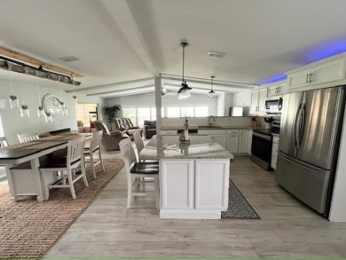 Such a pleasure to move into this updated DREAM HOME located on on Del Tura Golf and Country Club in Florida - for sale on GolfHomes.com, golf home, golf lot