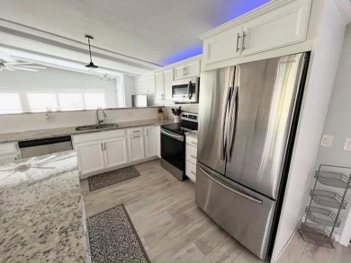 Such a pleasure to move into this updated DREAM HOME located on on Del Tura Golf and Country Club in Florida - for sale on GolfHomes.com, golf home, golf lot