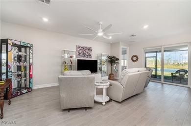 This Delray model from the Traditional Series features a tile on Herons Glen Golf and Country Club in Florida - for sale on GolfHomes.com, golf home, golf lot
