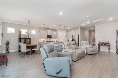 This Delray model from the Traditional Series features a tile on Herons Glen Golf and Country Club in Florida - for sale on GolfHomes.com, golf home, golf lot