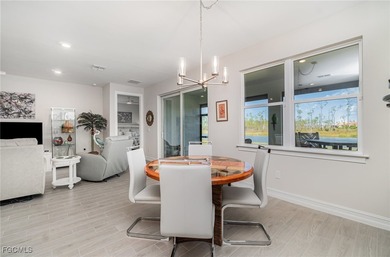 This Delray model from the Traditional Series features a tile on Herons Glen Golf and Country Club in Florida - for sale on GolfHomes.com, golf home, golf lot