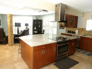 Meet your new poolside desert retreat! This 1,400 sf condo has on Cathedral Canyon Golf and Tennis Club in California - for sale on GolfHomes.com, golf home, golf lot
