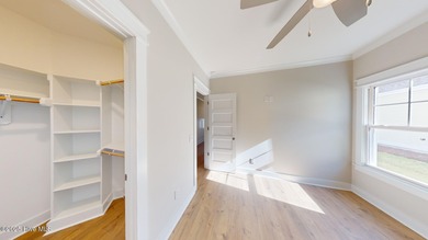 If you've been watching for the perfect coastal home, this on Brick Landing Plantation Yacht and Golf Club in North Carolina - for sale on GolfHomes.com, golf home, golf lot