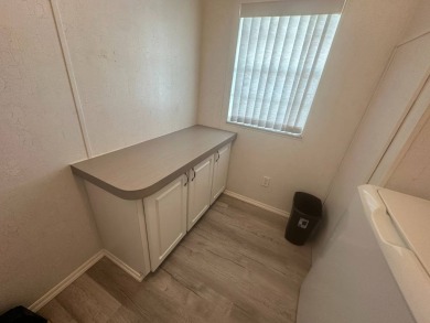 BEAUTIFUL 3 BEDROOM HOME ON GOLF COURSE WITH A GARAGE - REDUCED on Four Lakes Golf Club in Florida - for sale on GolfHomes.com, golf home, golf lot