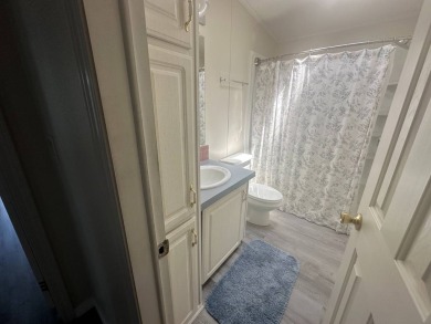 BEAUTIFUL 3 BEDROOM HOME ON GOLF COURSE WITH A GARAGE - REDUCED on Four Lakes Golf Club in Florida - for sale on GolfHomes.com, golf home, golf lot