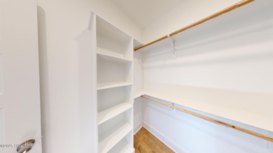 If you've been watching for the perfect coastal home, this on Brick Landing Plantation Yacht and Golf Club in North Carolina - for sale on GolfHomes.com, golf home, golf lot