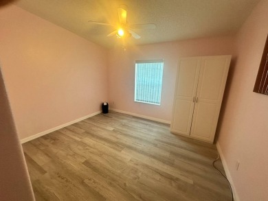 BEAUTIFUL 3 BEDROOM HOME ON GOLF COURSE WITH A GARAGE - REDUCED on Four Lakes Golf Club in Florida - for sale on GolfHomes.com, golf home, golf lot