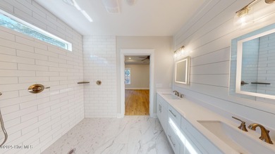 If you've been watching for the perfect coastal home, this on Brick Landing Plantation Yacht and Golf Club in North Carolina - for sale on GolfHomes.com, golf home, golf lot