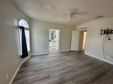 BEAUTIFUL 3 BEDROOM HOME ON GOLF COURSE WITH A GARAGE - REDUCED on Four Lakes Golf Club in Florida - for sale on GolfHomes.com, golf home, golf lot