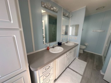 BEAUTIFUL 3 BEDROOM HOME ON GOLF COURSE WITH A GARAGE - REDUCED on Four Lakes Golf Club in Florida - for sale on GolfHomes.com, golf home, golf lot