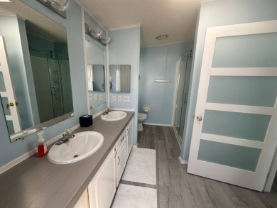 BEAUTIFUL 3 BEDROOM HOME ON GOLF COURSE WITH A GARAGE - REDUCED on Four Lakes Golf Club in Florida - for sale on GolfHomes.com, golf home, golf lot