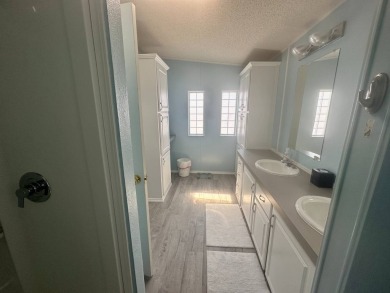 BEAUTIFUL 3 BEDROOM HOME ON GOLF COURSE WITH A GARAGE - REDUCED on Four Lakes Golf Club in Florida - for sale on GolfHomes.com, golf home, golf lot