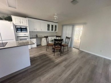 BEAUTIFUL 3 BEDROOM HOME ON GOLF COURSE WITH A GARAGE - REDUCED on Four Lakes Golf Club in Florida - for sale on GolfHomes.com, golf home, golf lot