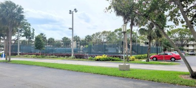 Beautiful ground floor with fantastic golf views, bright and on Deer Creek Golf Club in Florida - for sale on GolfHomes.com, golf home, golf lot
