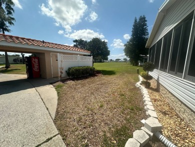 BEAUTIFUL 3 BEDROOM HOME ON GOLF COURSE WITH A GARAGE - REDUCED on Four Lakes Golf Club in Florida - for sale on GolfHomes.com, golf home, golf lot