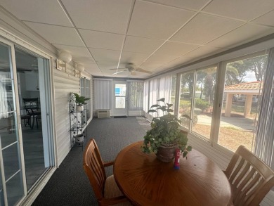 BEAUTIFUL 3 BEDROOM HOME ON GOLF COURSE WITH A GARAGE - REDUCED on Four Lakes Golf Club in Florida - for sale on GolfHomes.com, golf home, golf lot