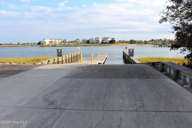 If you've been watching for the perfect coastal home, this on Brick Landing Plantation Yacht and Golf Club in North Carolina - for sale on GolfHomes.com, golf home, golf lot
