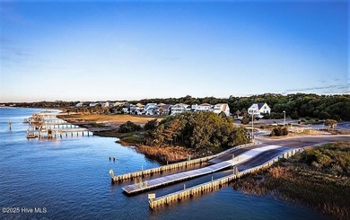If you've been watching for the perfect coastal home, this on Brick Landing Plantation Yacht and Golf Club in North Carolina - for sale on GolfHomes.com, golf home, golf lot