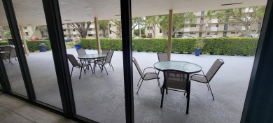 Beautiful ground floor with fantastic golf views, bright and on Deer Creek Golf Club in Florida - for sale on GolfHomes.com, golf home, golf lot