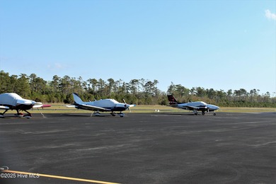 If you've been watching for the perfect coastal home, this on Brick Landing Plantation Yacht and Golf Club in North Carolina - for sale on GolfHomes.com, golf home, golf lot