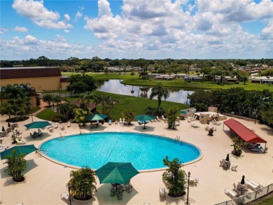 Welcome Home! This meticulously maintained home in the gated on Falcon Watch Golf Club in Florida - for sale on GolfHomes.com, golf home, golf lot