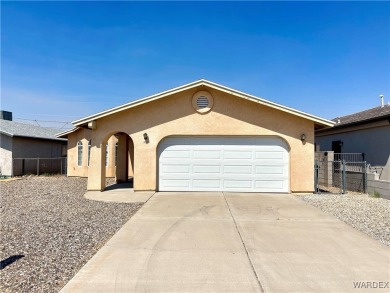 Don't miss out on this great 3 Bedroom 2 Bath home in the center on Cerbat Cliffs Golf Course in Arizona - for sale on GolfHomes.com, golf home, golf lot