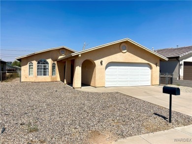 Don't miss out on this great 3 Bedroom 2 Bath home in the center on Cerbat Cliffs Golf Course in Arizona - for sale on GolfHomes.com, golf home, golf lot