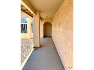 Don't miss out on this great 3 Bedroom 2 Bath home in the center on Cerbat Cliffs Golf Course in Arizona - for sale on GolfHomes.com, golf home, golf lot