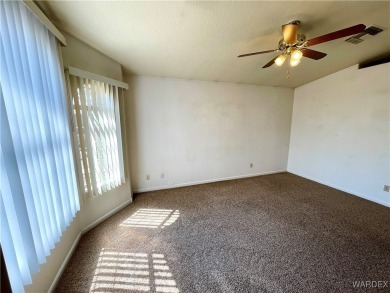 Don't miss out on this great 3 Bedroom 2 Bath home in the center on Cerbat Cliffs Golf Course in Arizona - for sale on GolfHomes.com, golf home, golf lot