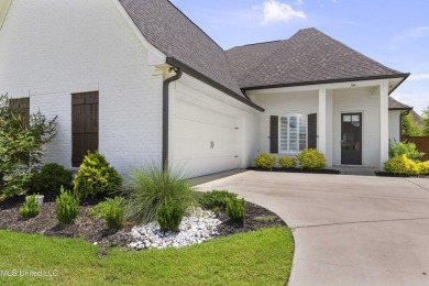Do not miss this Beautiful white brick home with wonderful on Lake Caroline Golf Club in Mississippi - for sale on GolfHomes.com, golf home, golf lot