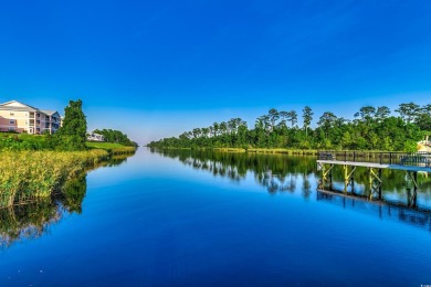 Location! Location! Location! This first-floor, end-unit condo on River Oaks Golf Plantation  in South Carolina - for sale on GolfHomes.com, golf home, golf lot